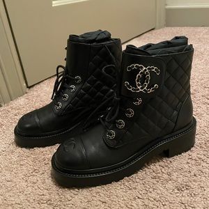 Black CHANEL combat boots. 100% authentic. Brand new. Includes box and dust bags